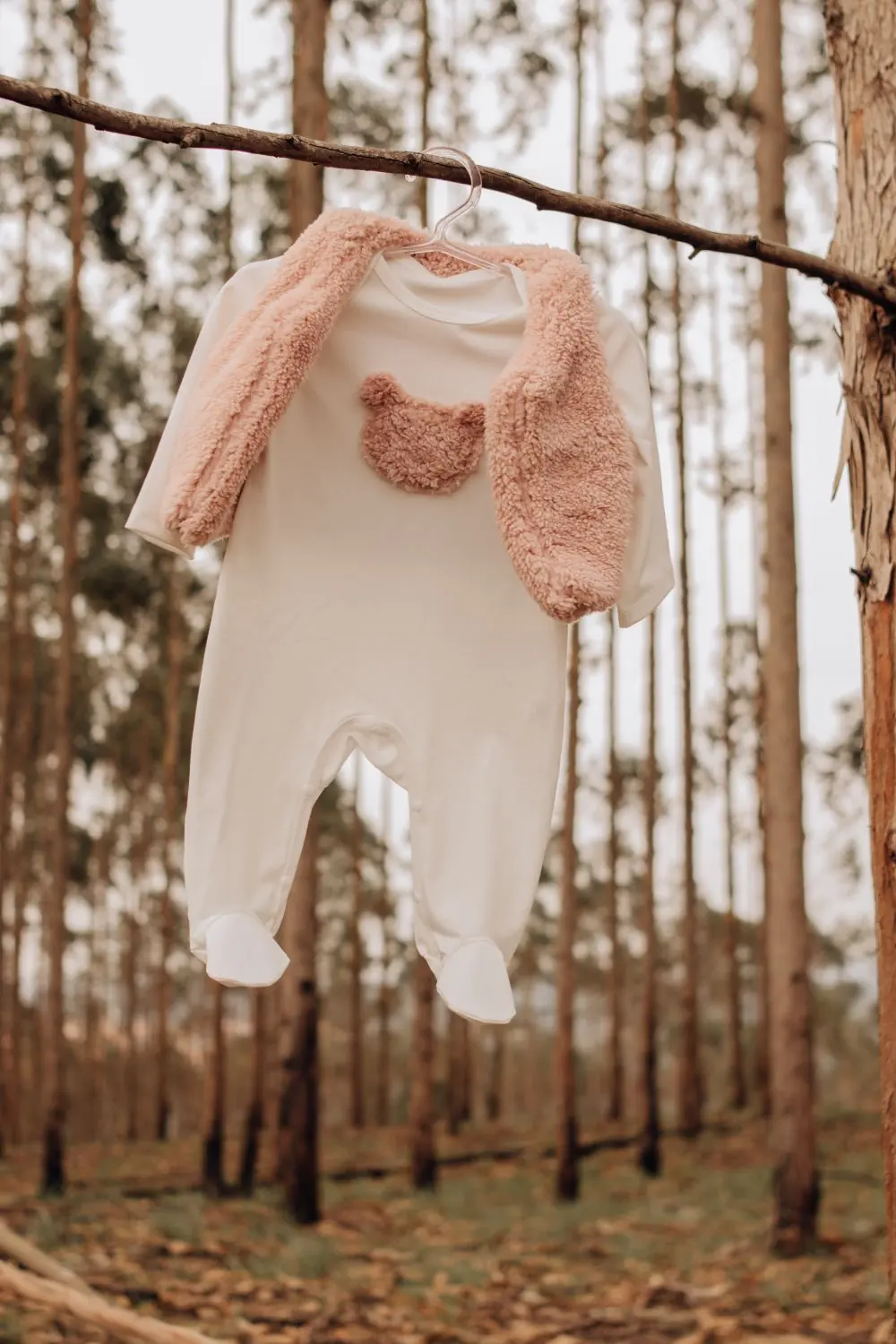 Reference photo 2: baby outfit hanging on a branch — kidswear we manufacture and export in bulk to Accra, Ghana